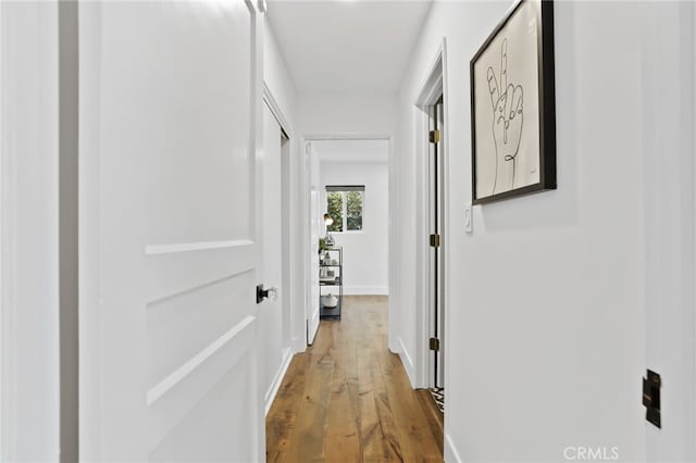 hall featuring light hardwood / wood-style flooring