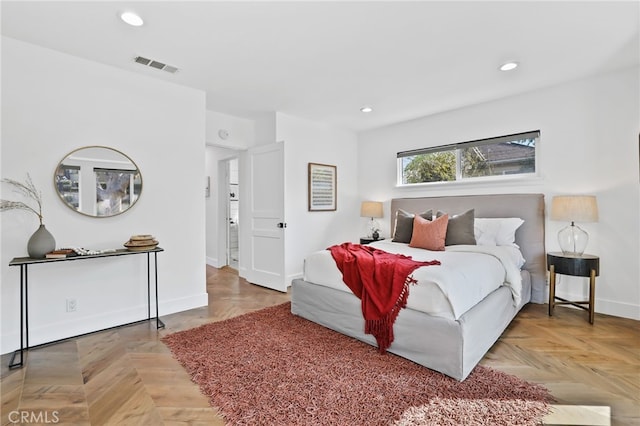 bedroom featuring parquet floors