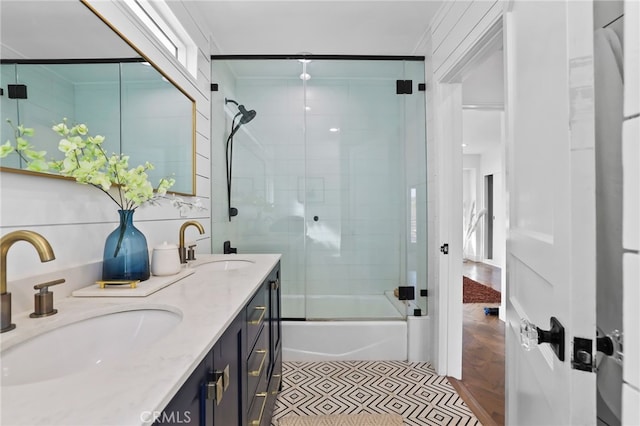 bathroom with vanity, tile patterned floors, and shower / bath combination with glass door