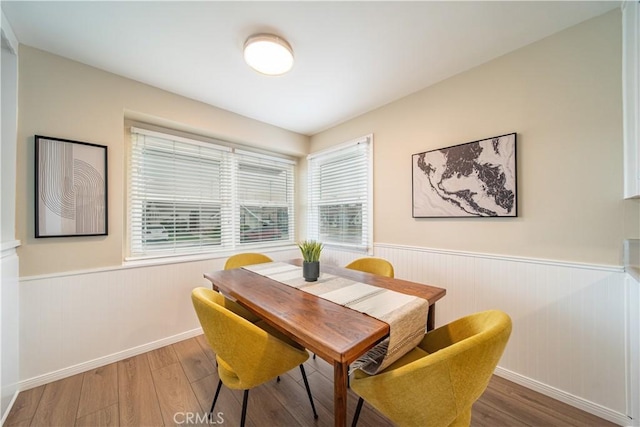 dining space featuring hardwood / wood-style floors