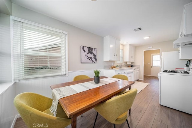 dining area featuring light hardwood / wood-style flooring