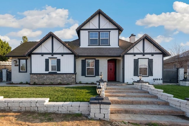 160 Friesian St, Norco, CA 92860 - tudor house with a tiled roof and stone siding