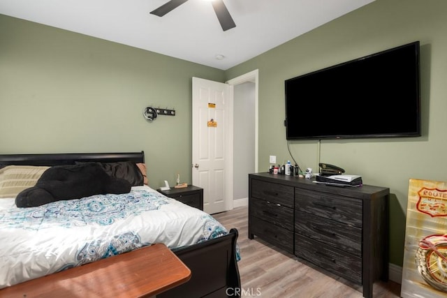 bedroom featuring ceiling fan and light wood-type flooring