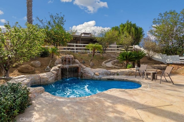 view of pool with a patio area