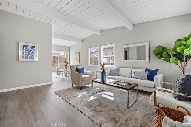 living room with vaulted ceiling with beams and wood-type flooring