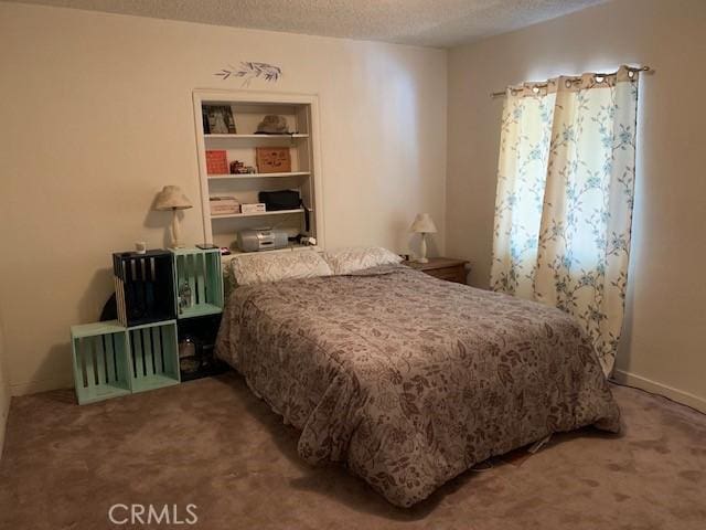 14650 Pearl Ave, Clearlake, CA 95422 - carpeted bedroom featuring a textured ceiling