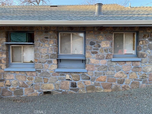 14650 Pearl Ave, Clearlake, CA 95422 - exterior view of stone siding and a shingled roof