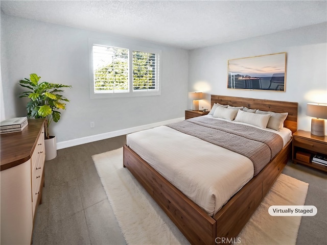 bedroom featuring a textured ceiling