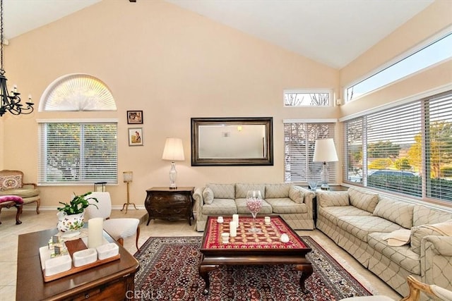 living room with light tile patterned flooring and high vaulted ceiling