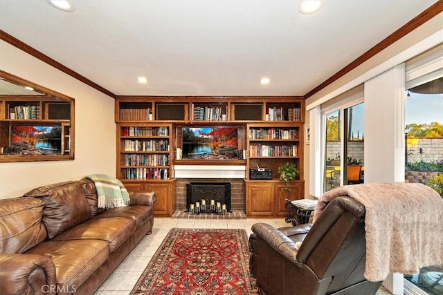 living room featuring ornamental molding, a brick fireplace, light tile patterned flooring, and built in features