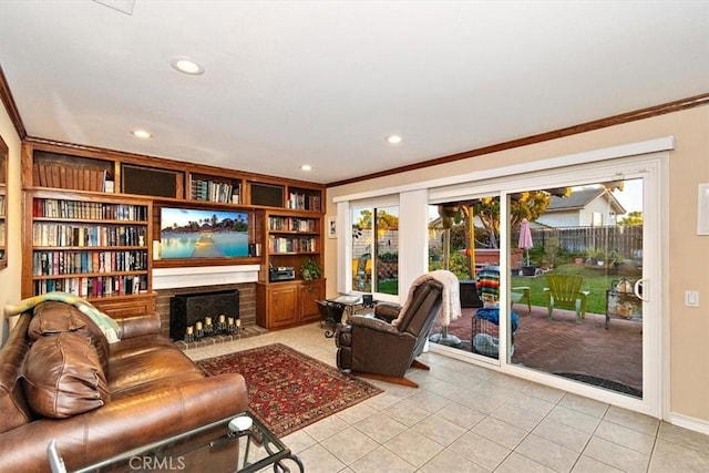 tiled living room with crown molding, a fireplace, and built in shelves