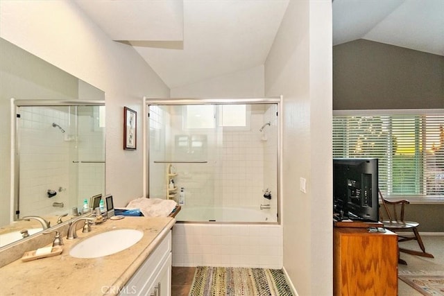 bathroom featuring vanity, tile patterned flooring, vaulted ceiling, and bath / shower combo with glass door