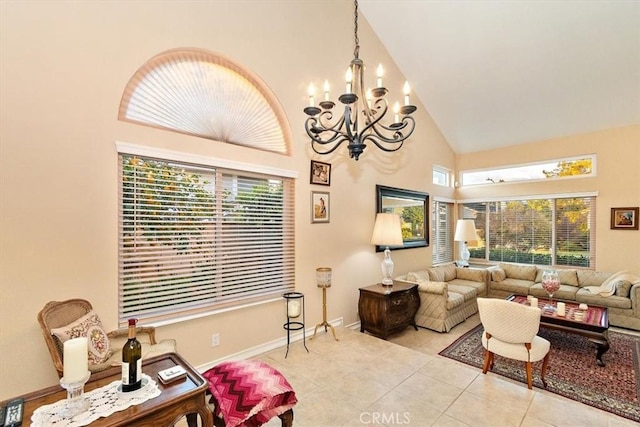 tiled living room with a chandelier and high vaulted ceiling