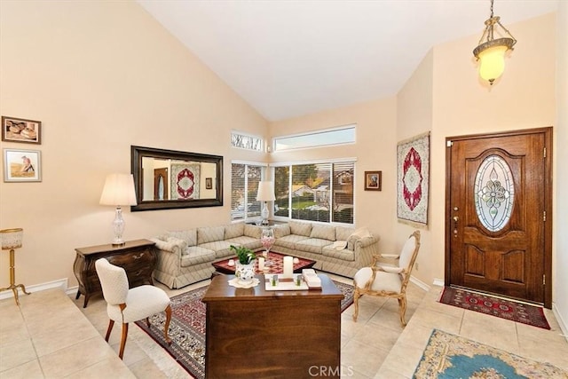 living room featuring high vaulted ceiling and light tile patterned floors