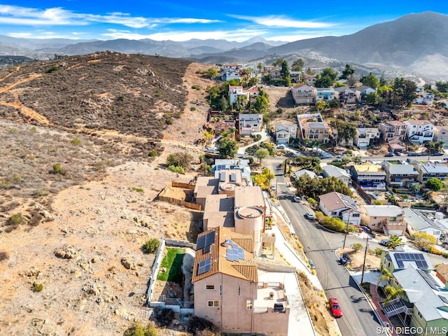 drone / aerial view featuring a mountain view