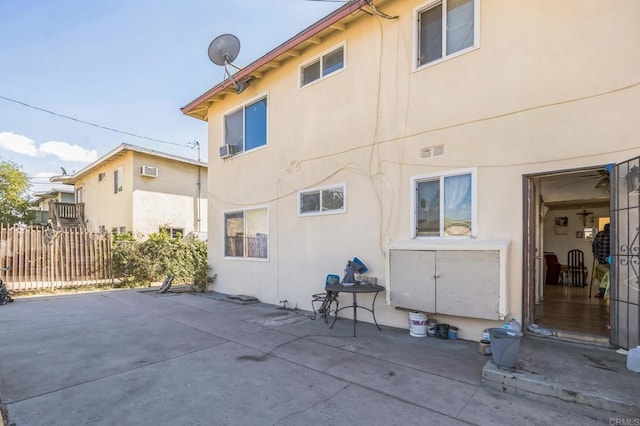 back of house with a patio area