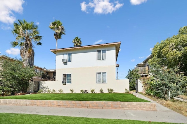 exterior space featuring a front yard