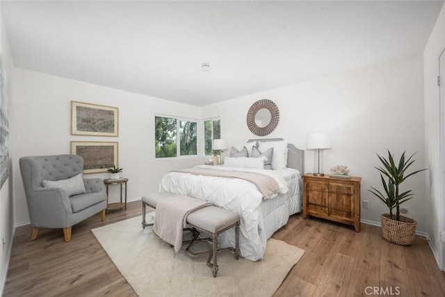 bedroom featuring light wood-type flooring