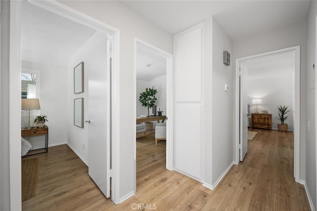 hallway featuring light hardwood / wood-style floors