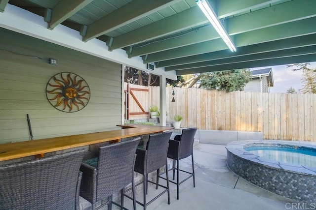 view of patio / terrace with a bar