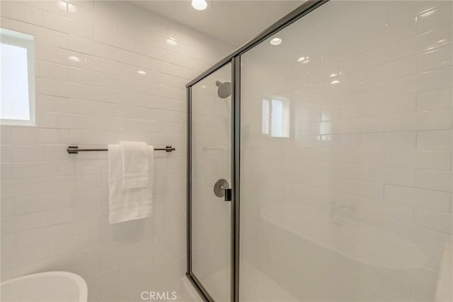 bathroom with plus walk in shower