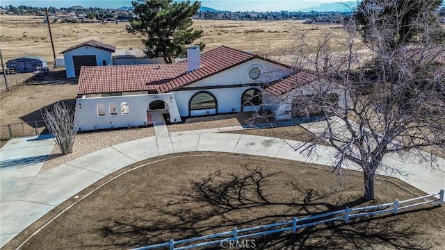 birds eye view of property featuring a rural view