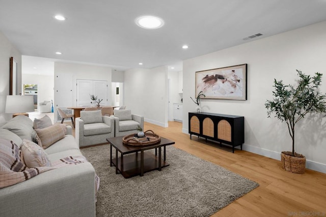 living room featuring light hardwood / wood-style flooring