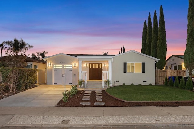 view of front of home with a lawn