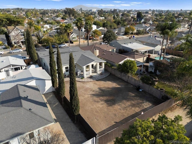 birds eye view of property featuring a mountain view