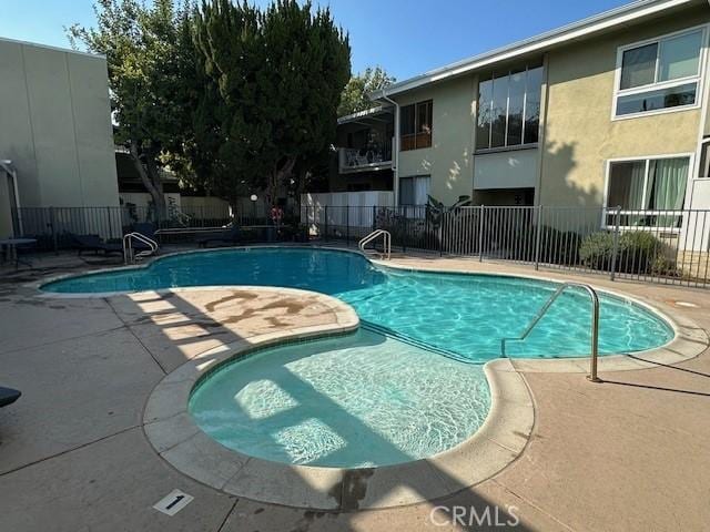 view of pool with a patio