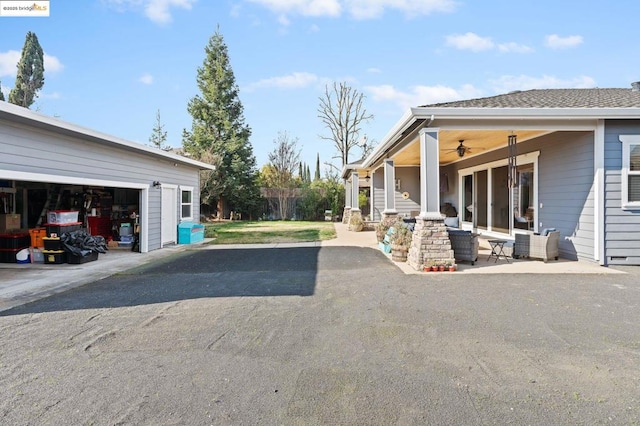 exterior space featuring a patio and ceiling fan