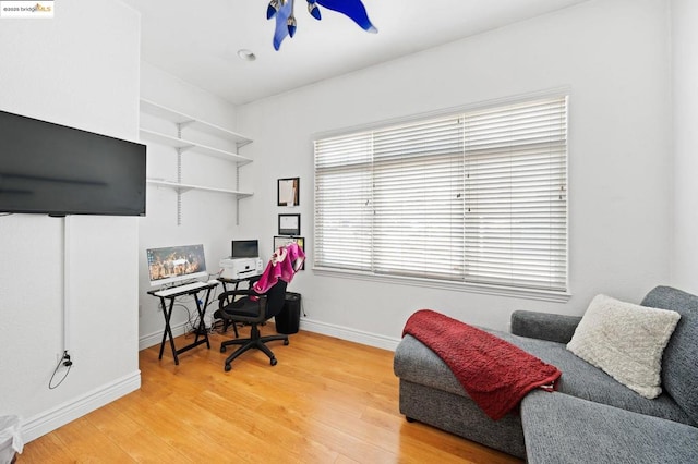 office space with hardwood / wood-style floors