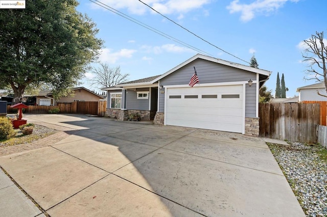 ranch-style home with a garage