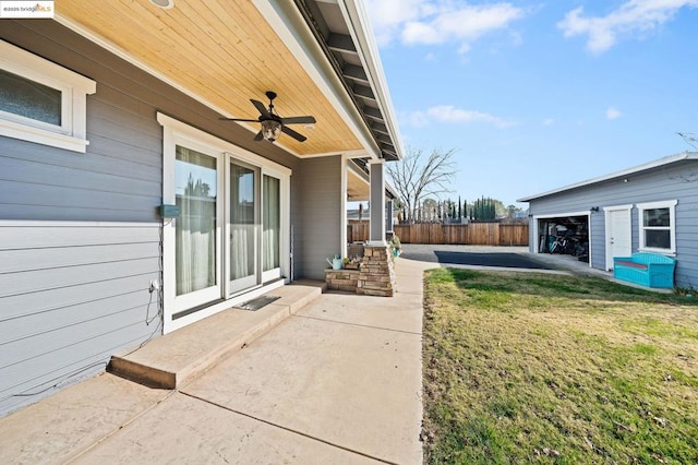 view of yard with a patio and ceiling fan