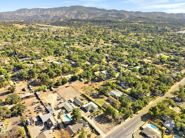 drone / aerial view featuring a mountain view