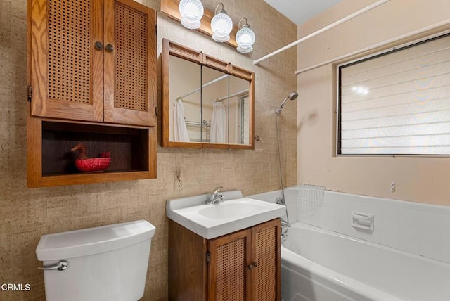 full bathroom with vanity, toilet, and shower / bath combo with shower curtain