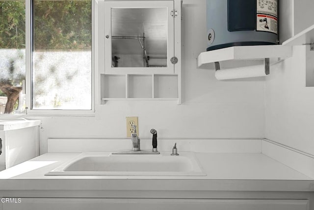 bathroom with sink and water heater