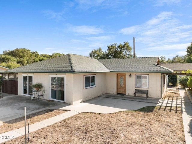 back of house with a patio area