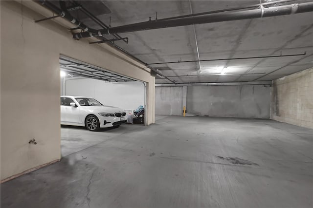 garage featuring a carport