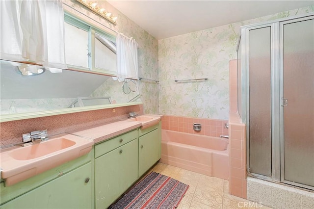 bathroom featuring tile patterned floors, vanity, and plus walk in shower