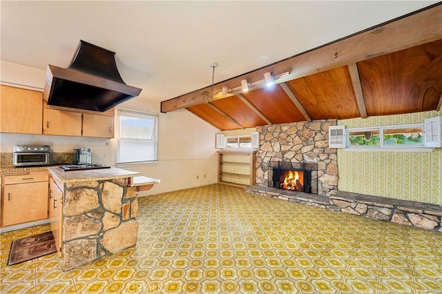 living room with a fireplace, lofted ceiling with beams, and wooden ceiling