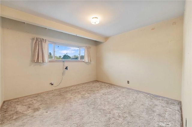 empty room featuring carpet flooring