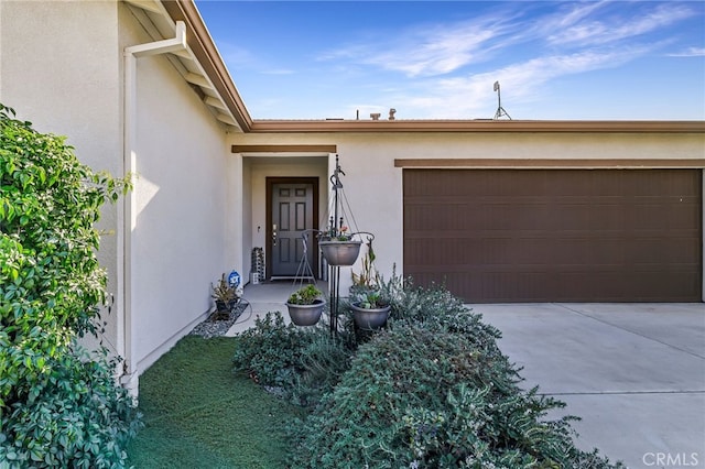 property entrance with a garage