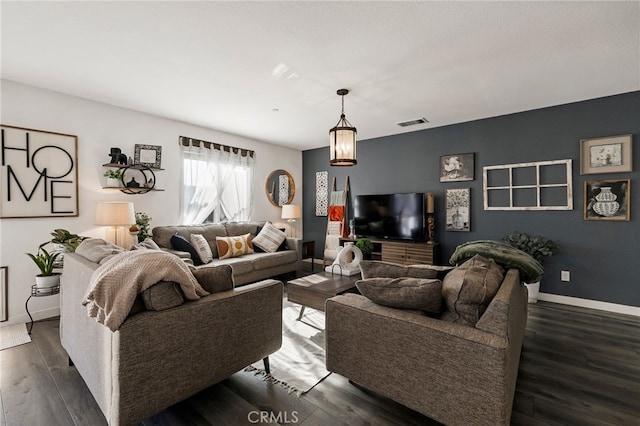 living room with dark wood-type flooring