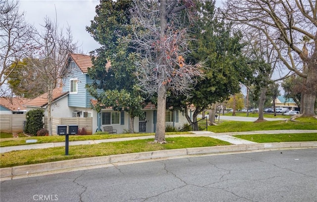 view of front of property with a front lawn