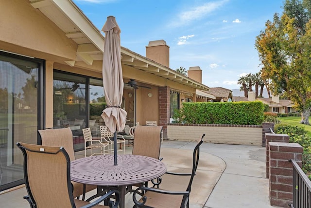 view of patio / terrace featuring ceiling fan