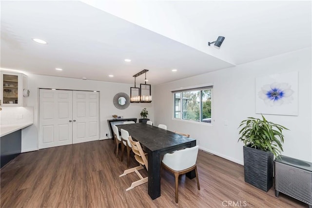 dining room with hardwood / wood-style floors