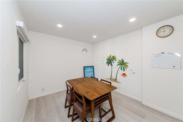 dining space featuring light hardwood / wood-style flooring