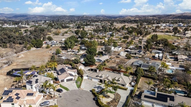 drone / aerial view featuring a mountain view