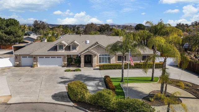 view of front of home with a garage